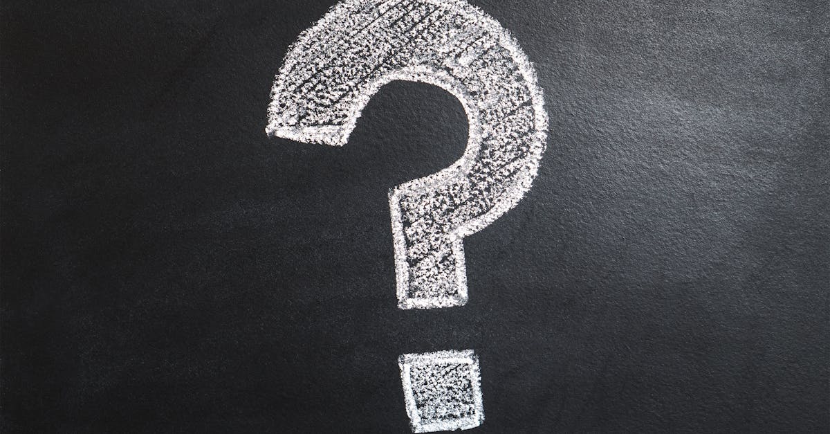 A conceptual image featuring a question mark drawn on a chalkboard, ideal for problem-solving contexts.